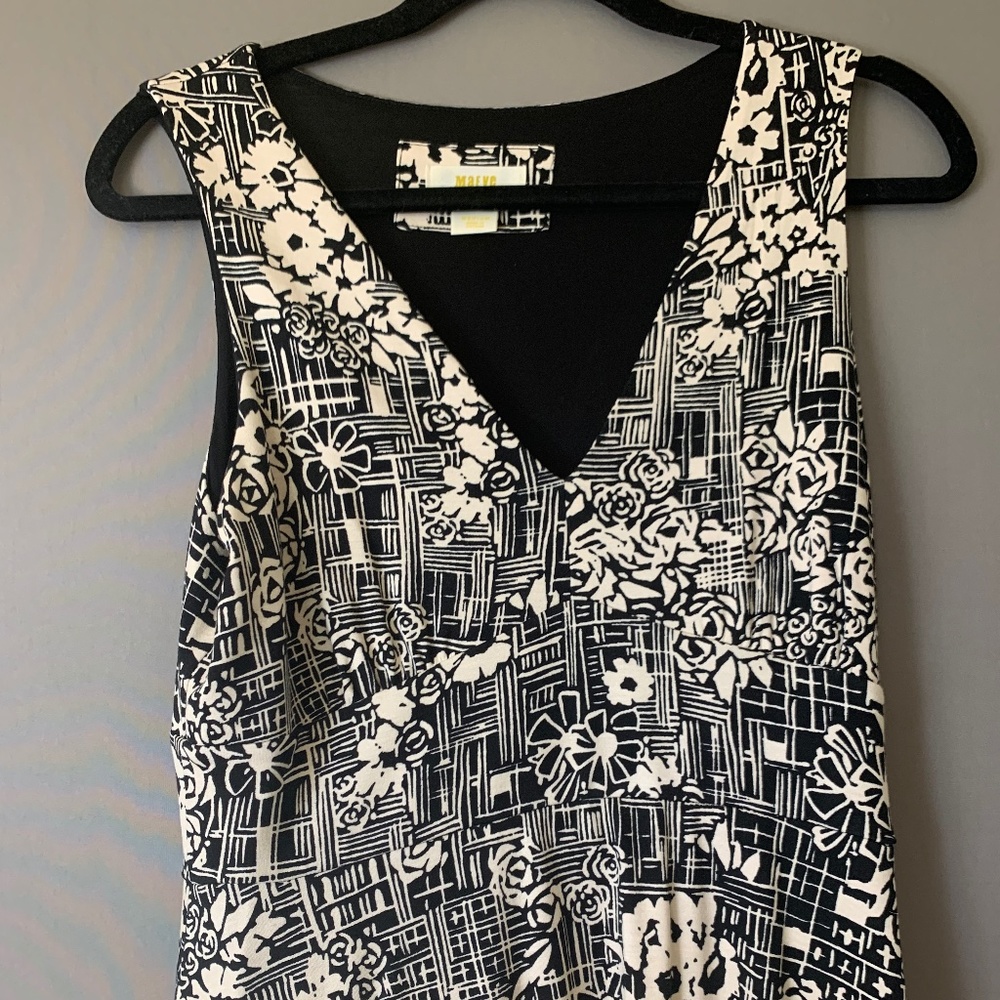 Mid length black and beige dress